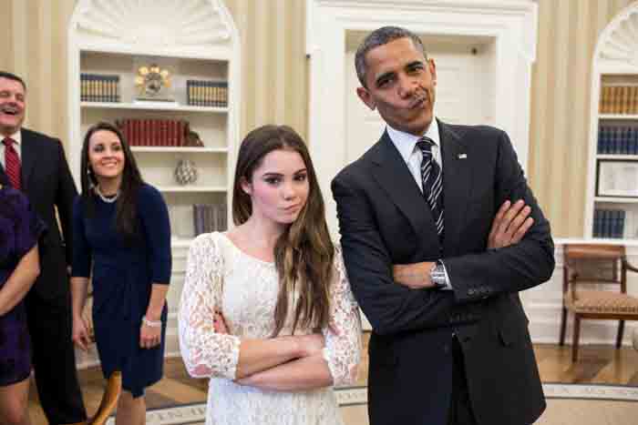 Barack Obama poses with "Not Impressed" facial expression along with Maroney.